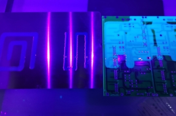 Fluorescent conformal coating